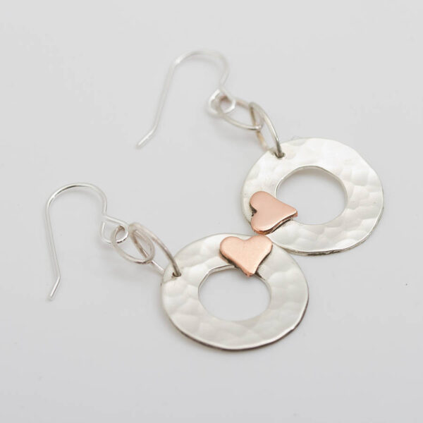 beaten silver disc earrings with gold hearts